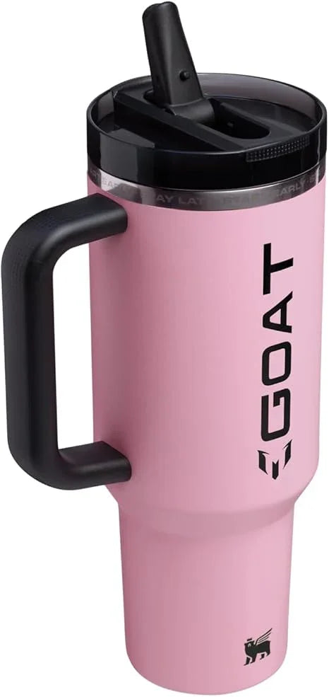 Pink GOAT insulated travel mug with black handle and flip-top lid