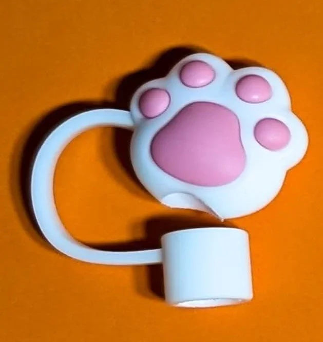 White and pink silicone cat paw-shaped case cover on orange background