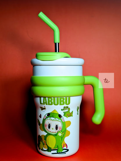 White kids tumbler with green handle and straw featuring cartoon dinosaur and 'LABUBU' text on orange background