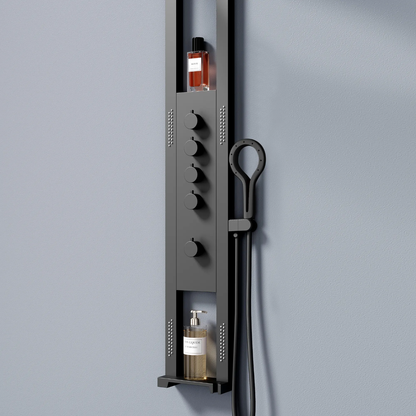 Modern black shower panel with five control knobs, built-in shelves holding bath products, mounted on gray wall