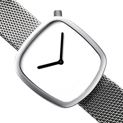 Minimalist silver wristwatch with mesh band and white dial showing 9:00