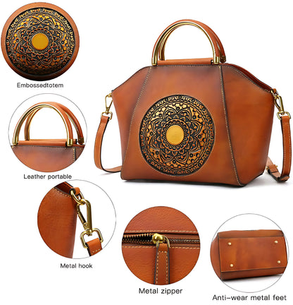 Brown leather handbag with embossed totem design, gold metal handles, hook, zipper, and anti-wear feet